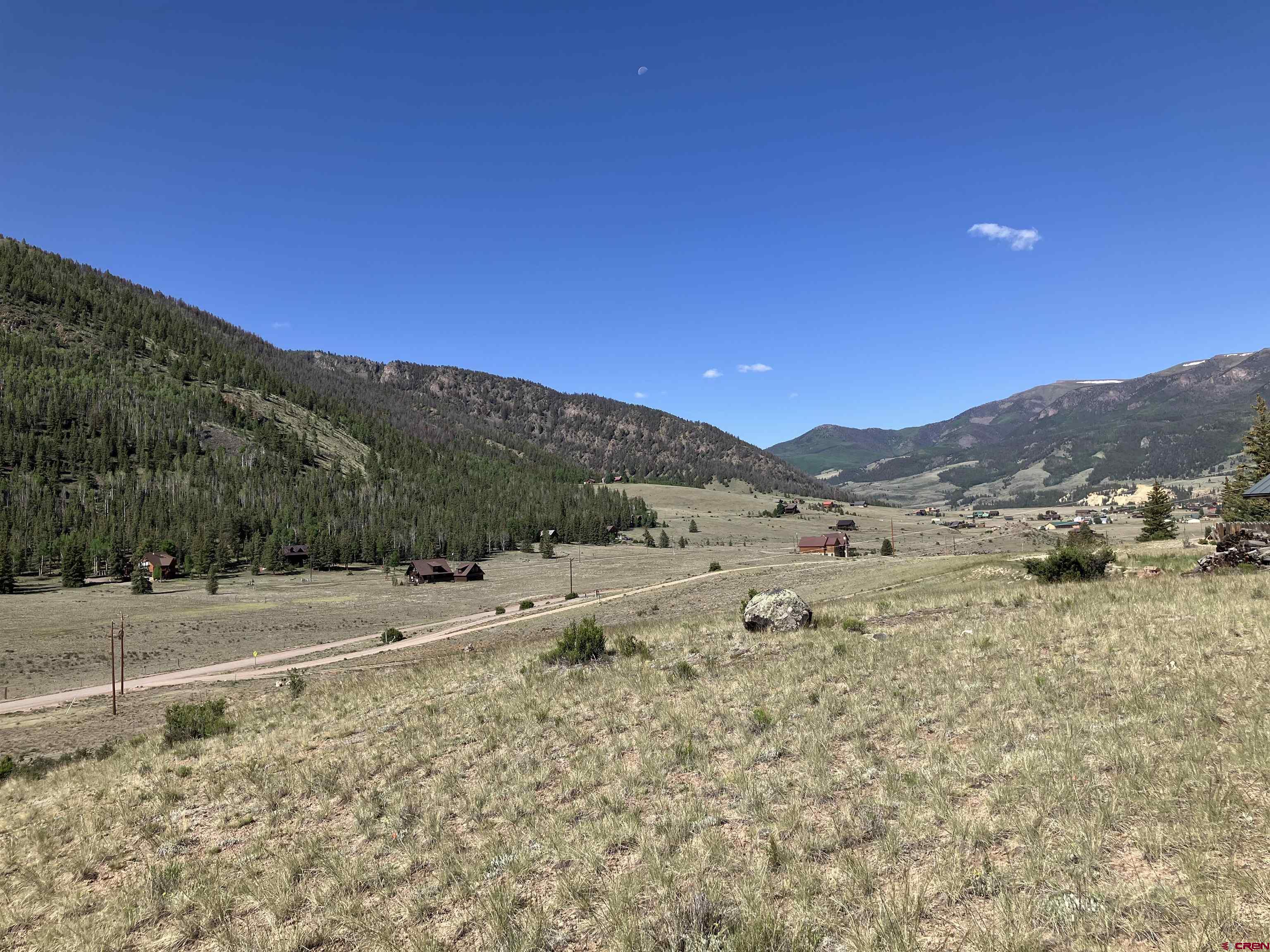 442 Deep Creek Road Creede, CO 81130 - Photo 33 of 45 a view of a dry yard with mountains in the background