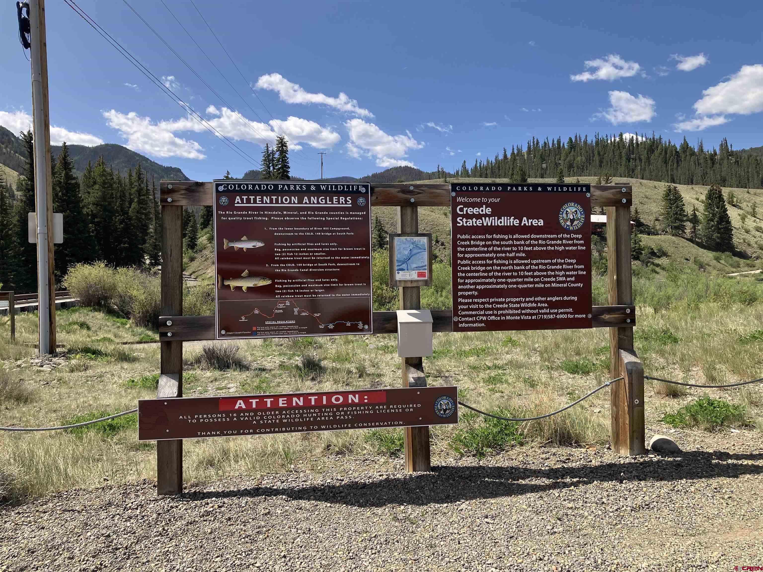 442 Deep Creek Road Creede, CO 81130 - Photo 45 of 45 a view of a bench sitting in middle of a yard