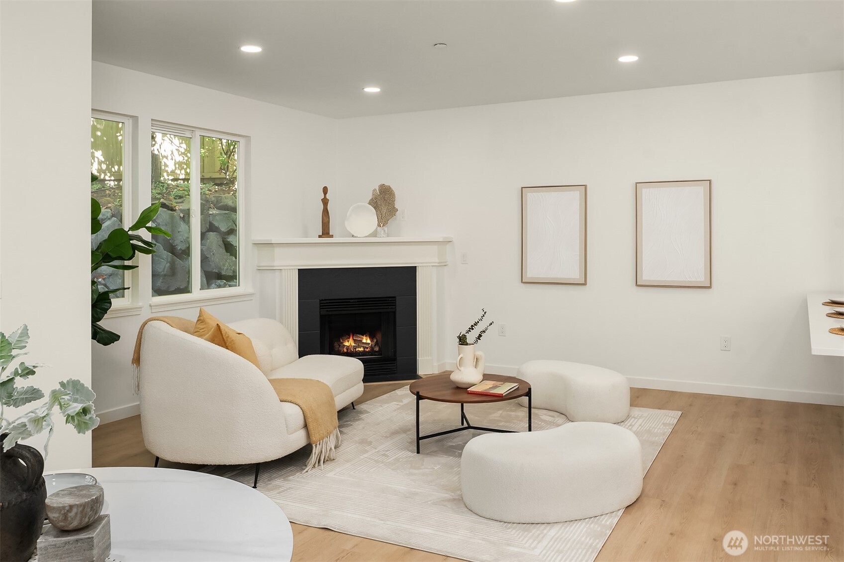 200 South 48th Street, Unit E Renton, WA 98055 - Photo 13 of 29 a living room with furniture and a fireplace