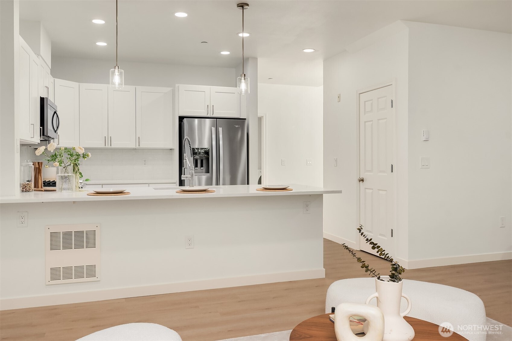 200 South 48th Street, Unit E Renton, WA 98055 - Photo 26 of 29 a bathroom with a sink and a mirror