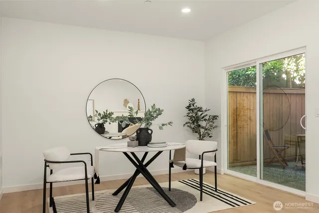 a view of a livingroom with furniture and window