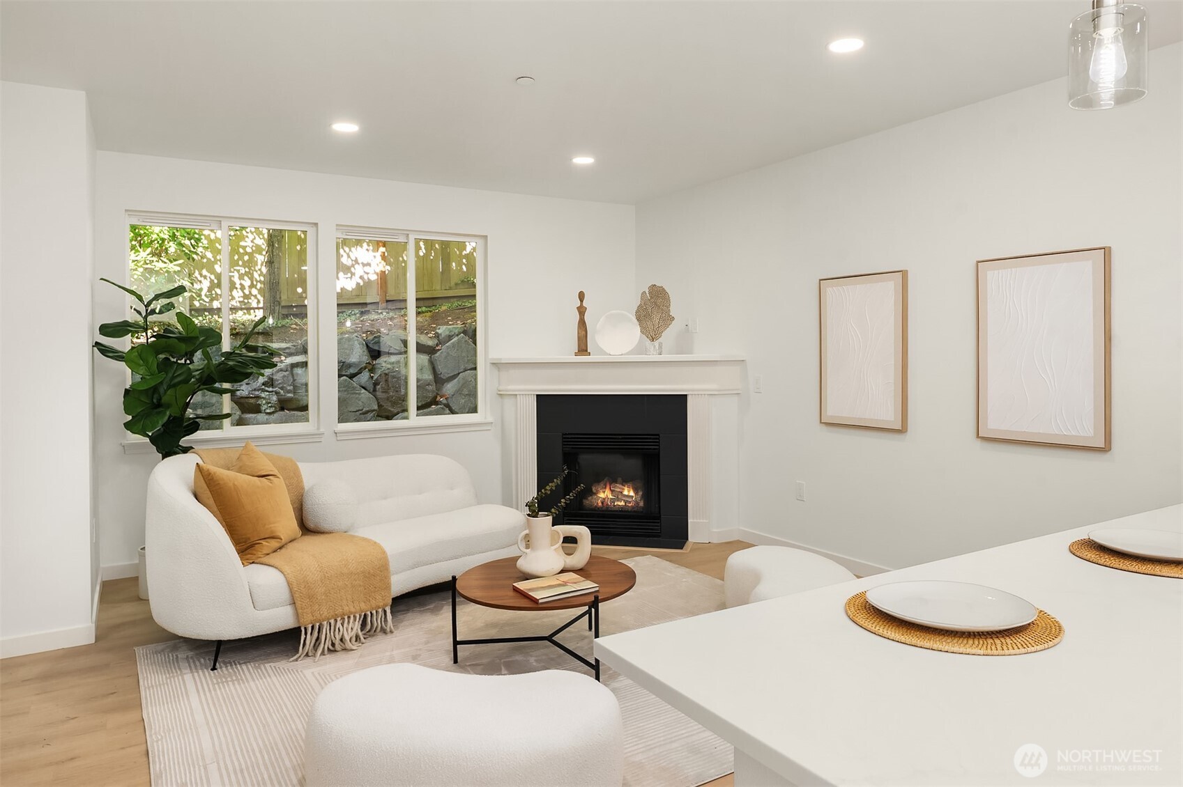 200 South 48th Street, Unit E Renton, WA 98055 - Photo 9 of 29 a living room with furniture and a fireplace