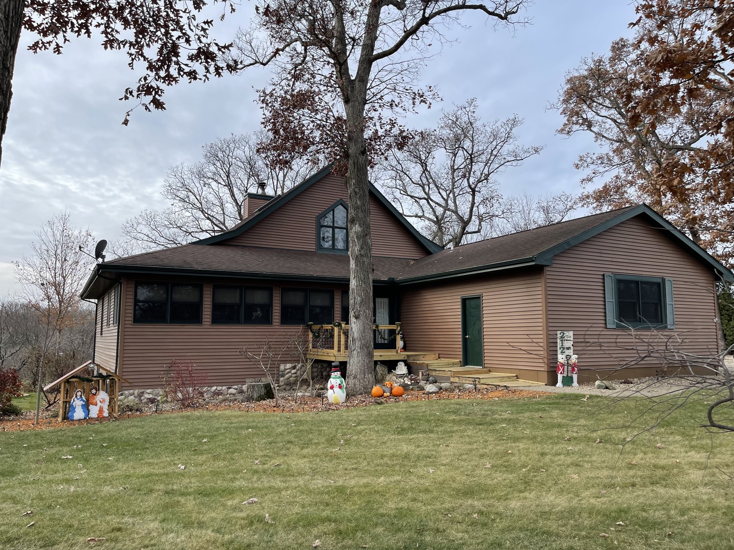 2121 East 875th Road Tonica, IL 61370 - Photo 2 of 17 a front view of a house with a garden