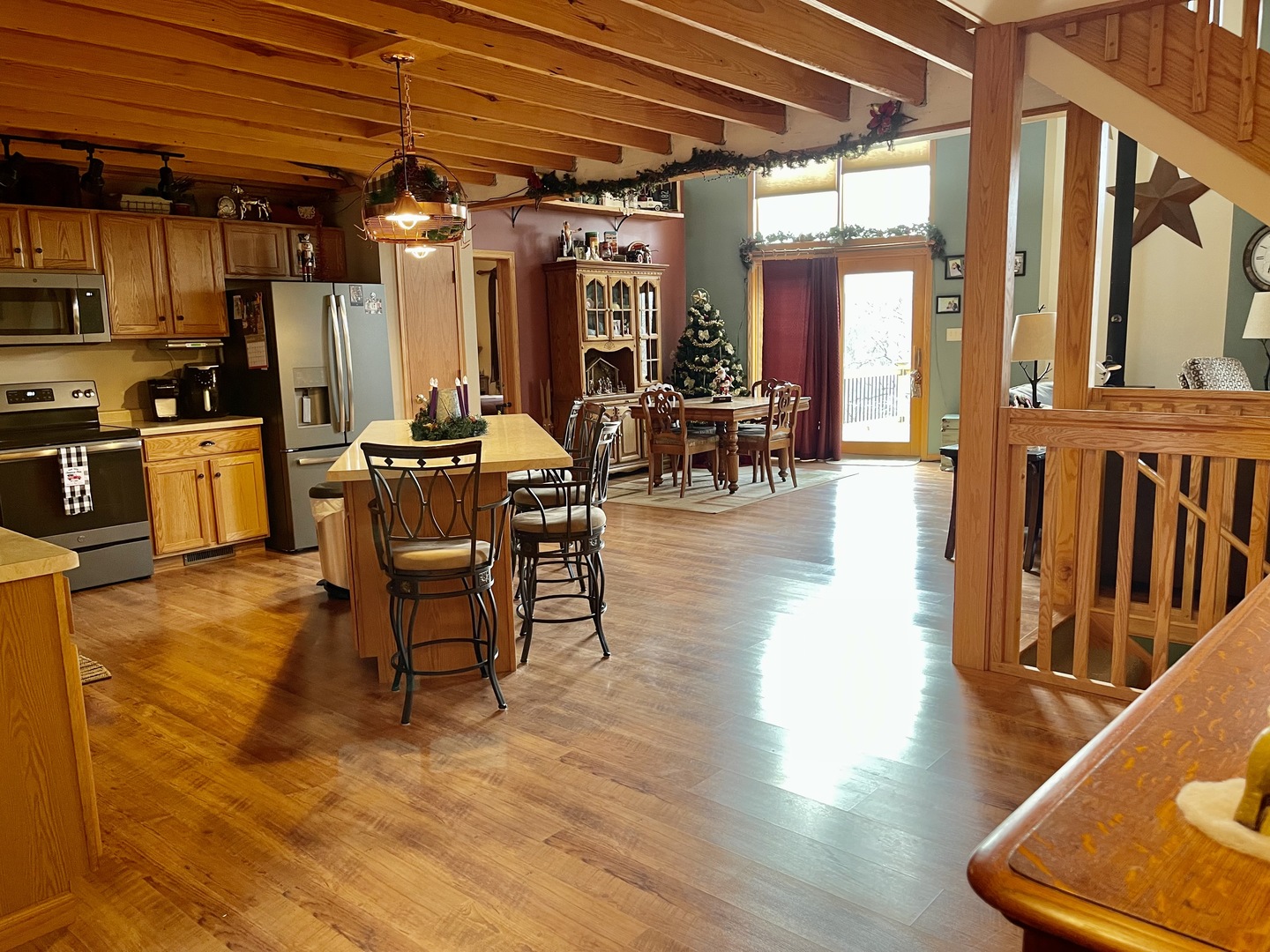 2121 East 875th Road Tonica, IL 61370 - Photo 13 of 17 a view of a dining room with furniture window and wooden floor