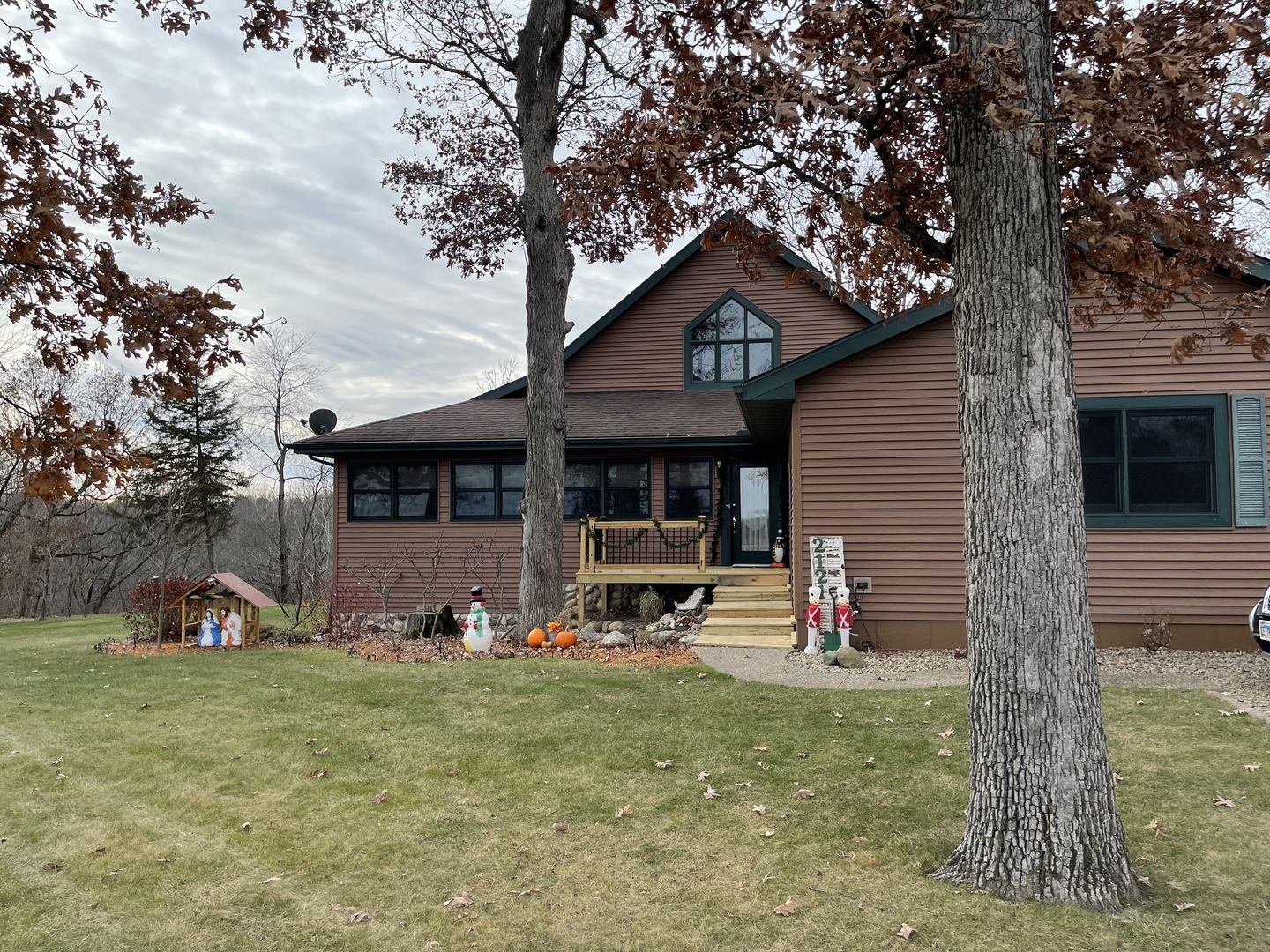 2121 East 875th Road Tonica, IL 61370 - Photo 3 of 17 a front view of a house with garden