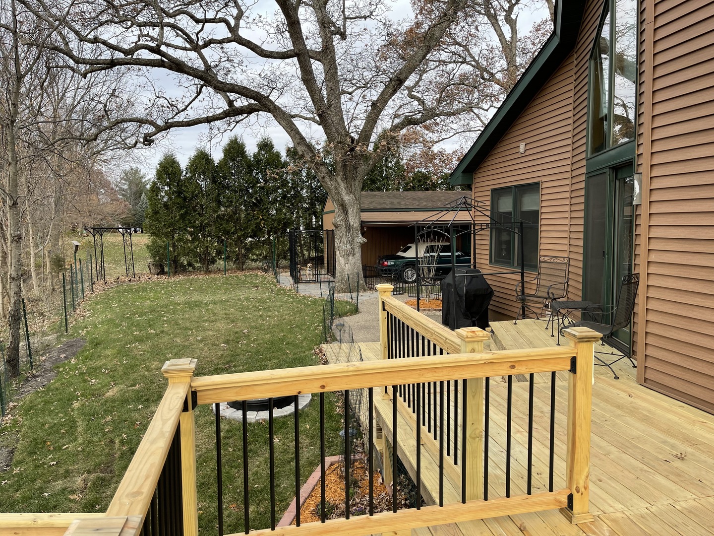 2121 East 875th Road Tonica, IL 61370 - Photo 8 of 17 a view of a deck with a backyard