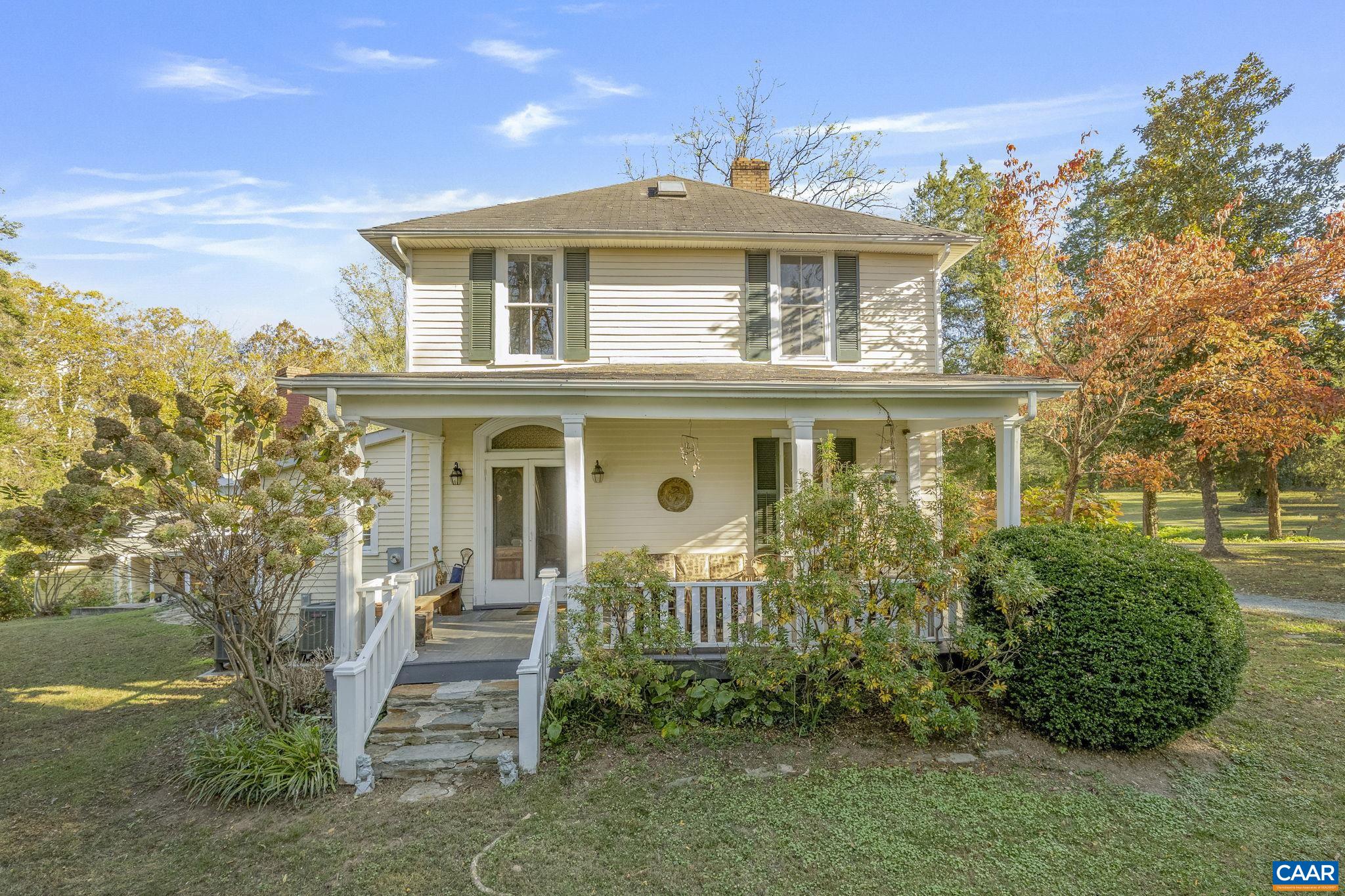 5515 L Gordonsville Road Keswick, VA 22947 - Photo 17 of 25 a front view of a house with a yard