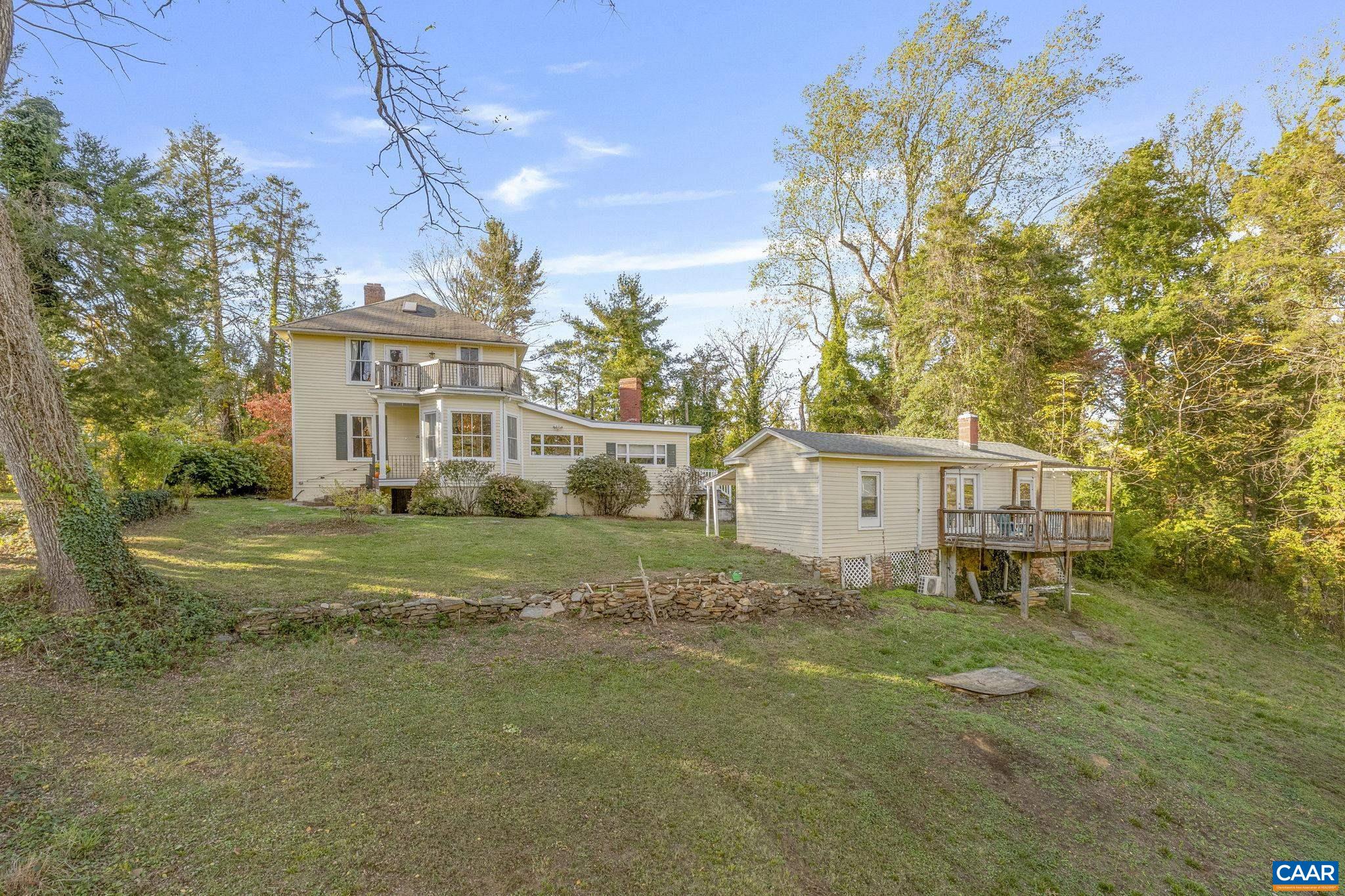 5515 L Gordonsville Road Keswick, VA 22947 - Photo 22 of 25 a view of a house with a big yard