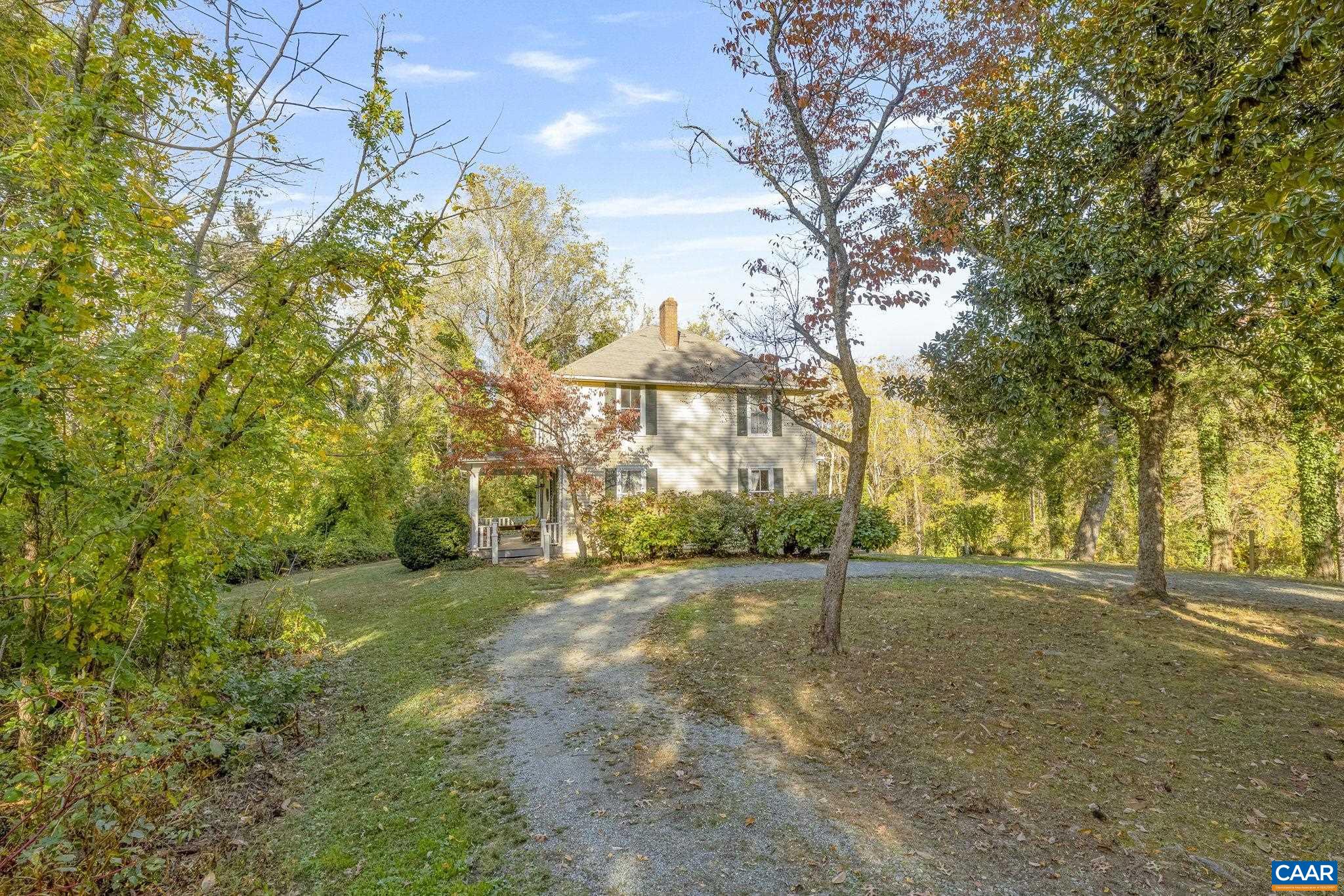 5515 L Gordonsville Road Keswick, VA 22947 - Photo 24 of 25 a view of a field with large trees