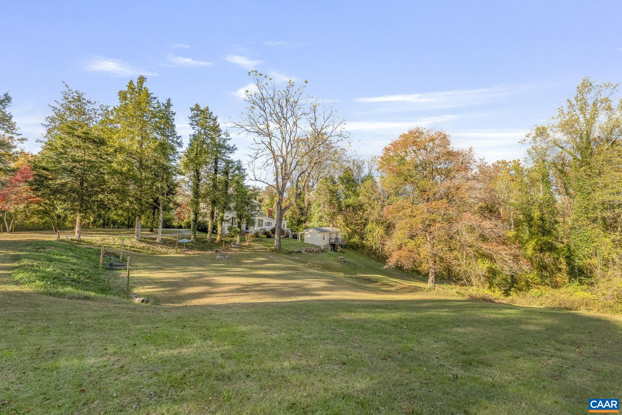 5515 L Gordonsville Road Keswick, VA 22947 - Photo 8 of 25 a view of yard with swimming pool and green space