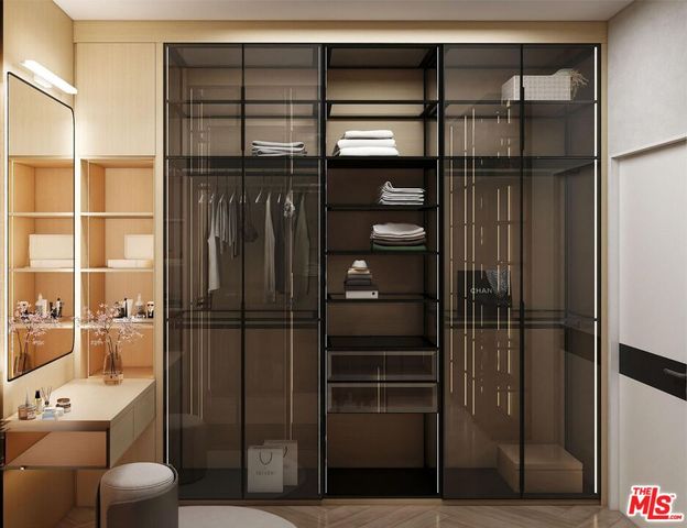 a kitchen with a refrigerator and cabinets