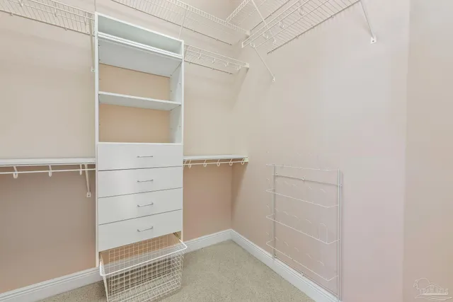 a bathroom with a sink a toilet and shower curtain