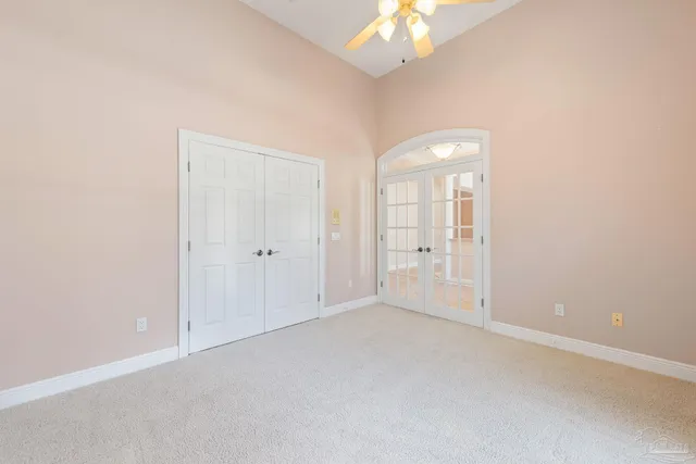 a view of a house with swimming pool and sitting area