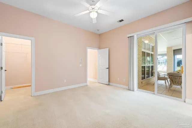 a view of a room with a large window