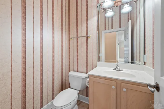 a view of a house with a yard and garage