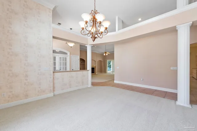 a view of a kitchen with a sink and a window