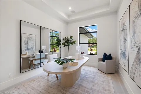 a workspace with furniture and window