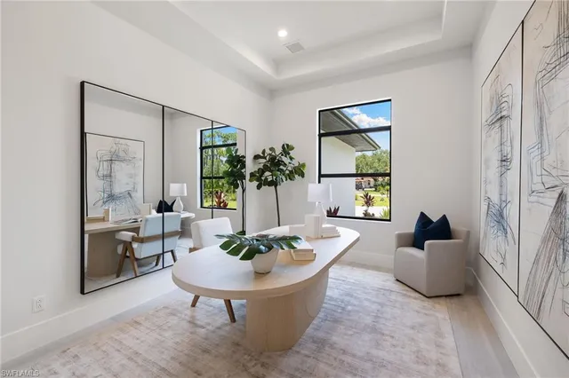 a workspace with furniture and window