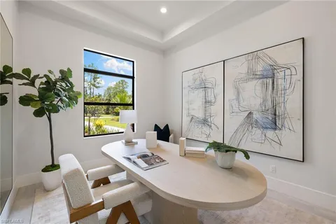 a kitchen with cabinets and washer