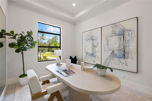 a kitchen with cabinets and washer