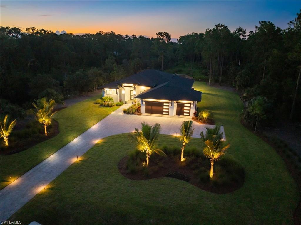 4751 1st Avenue Southwest Naples, FL 34119 - Photo 36 of 36 an aerial view of a house with pool garden view and a yard