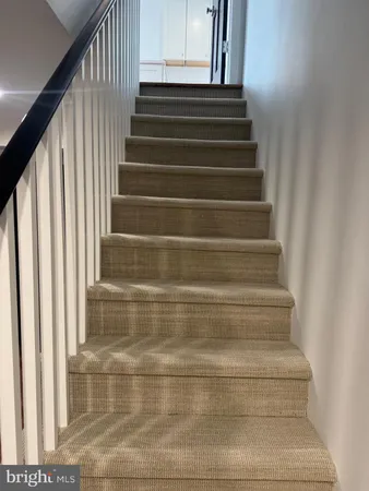 a bathroom with a toilet and a sink