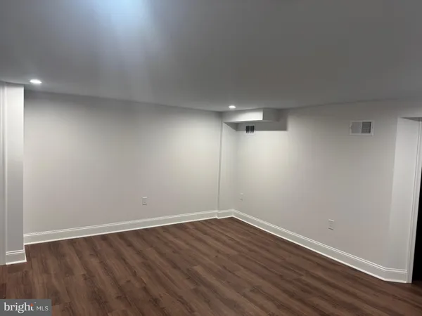 a bathroom with a shower and a bathtub
