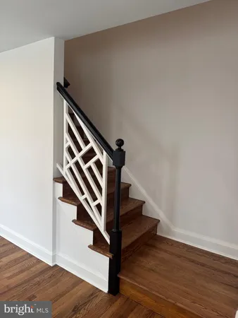 a view of entryway with wooden floor