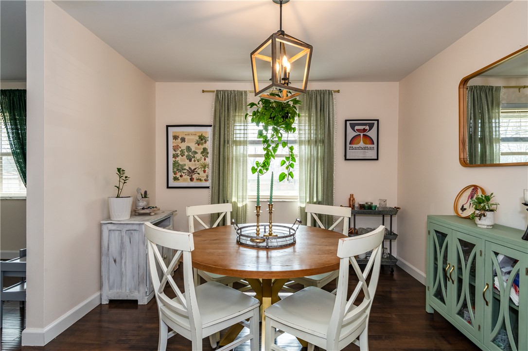 4102 Ridgetop Drive Bellbrook, OH 45305 - Photo 10 of 33 This dining area features rich hardwood floors and a striking overhead light fixture.
