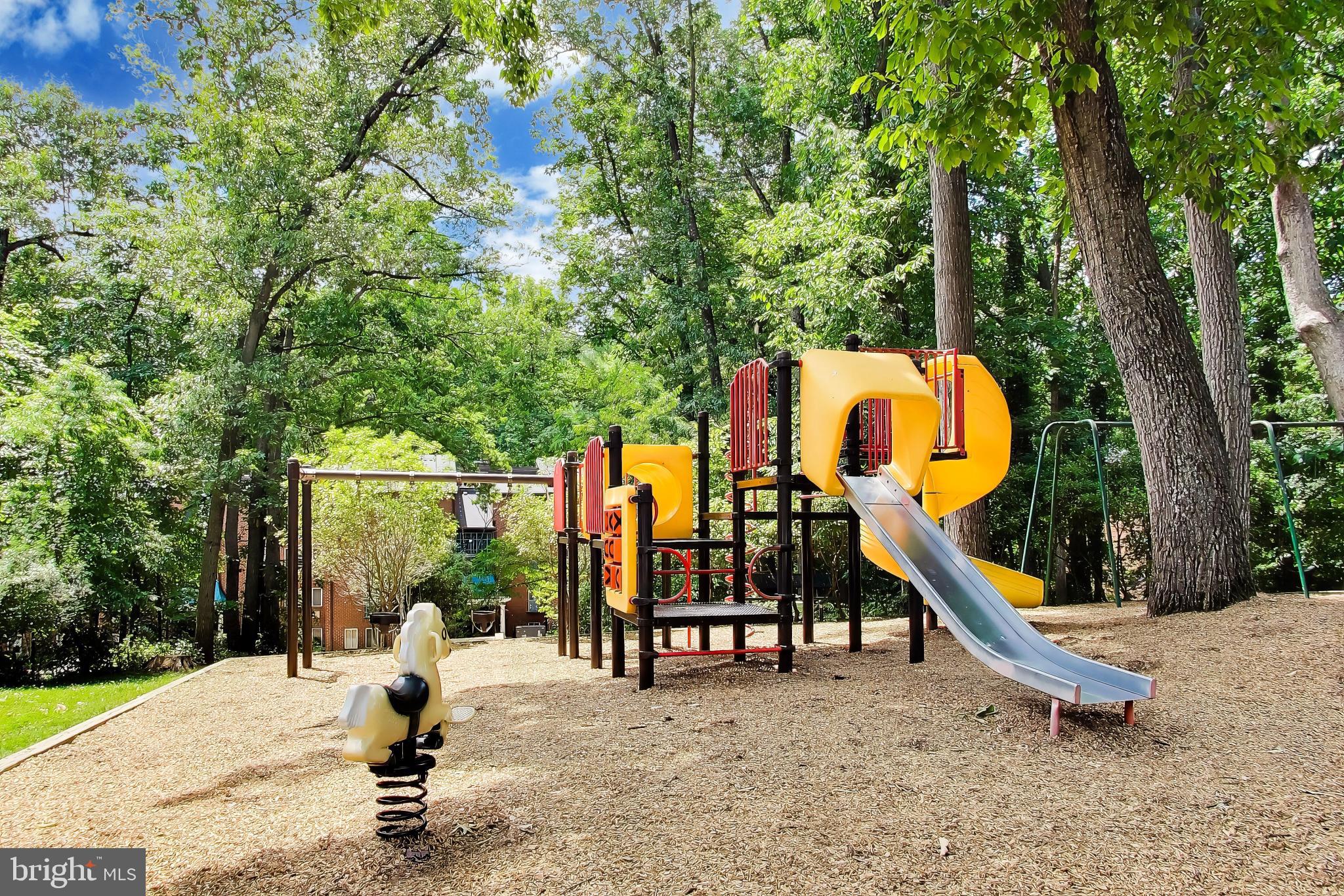 11830 Breton Court, Unit 23B Reston, VA 20191 - Photo 39 of 43 Vibrant playground nestled in nature.