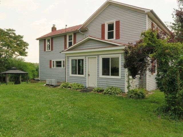 4113 Spring Hill Road Staunton, VA 24401 - Photo 2 of 49 a front view of a house with a garden