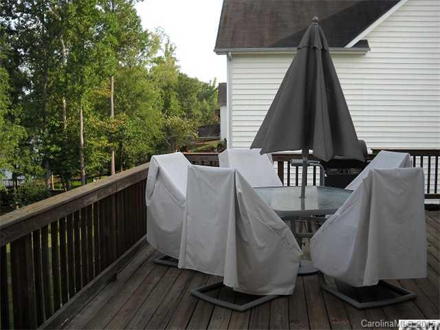 128 Lighthouse Road Mount Holly, NC 28120 - Photo 11 of 16 a view of balcony with furniture and wooden deck