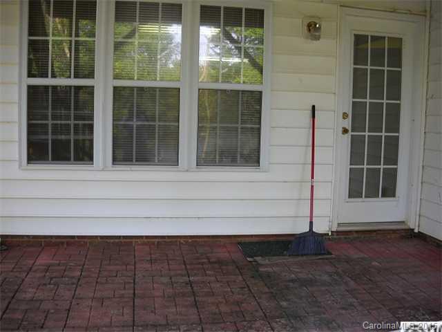 128 Lighthouse Road Mount Holly, NC 28120 - Photo 12 of 16 a view of a house with a large window