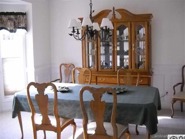 128 Lighthouse Road Mount Holly, NC 28120 - Photo 4 of 16 a dining room with furniture and window