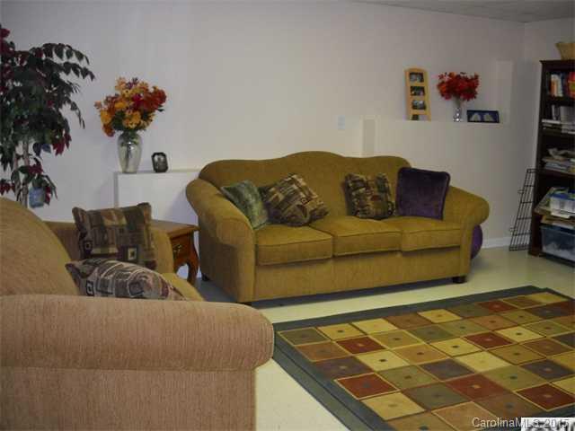 128 Lighthouse Road Mount Holly, NC 28120 - Photo 8 of 16 a living room with furniture
