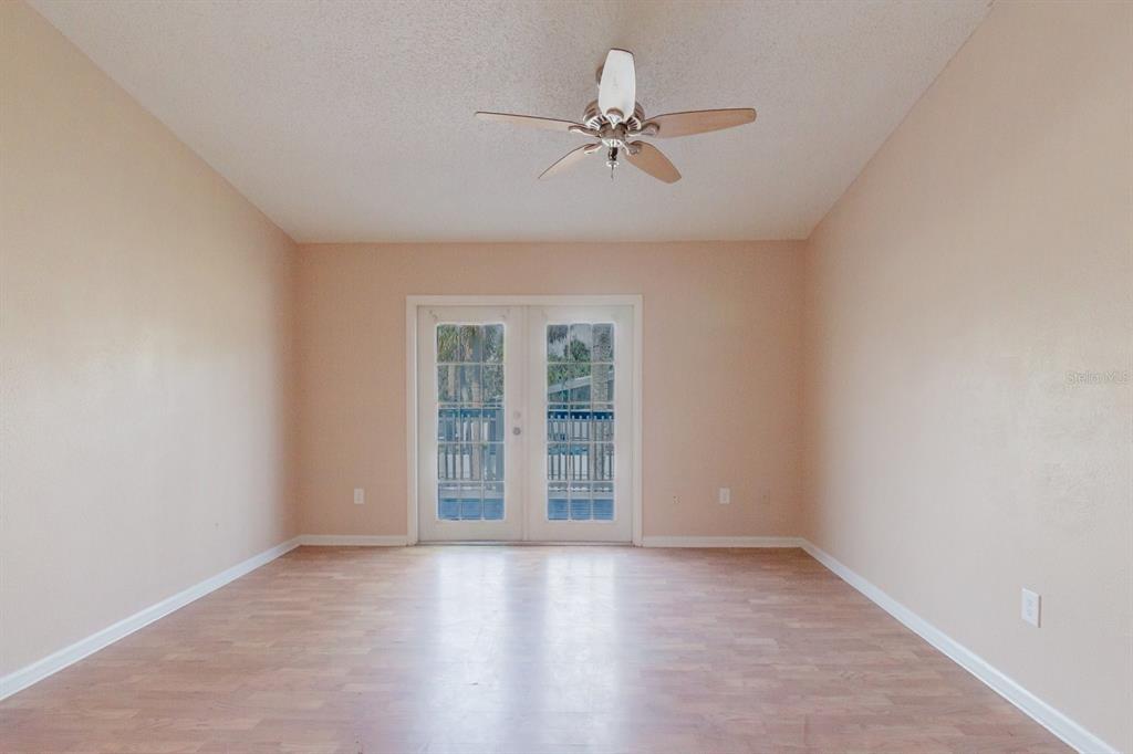 7804 Wilmar Court Port Richey, FL 34668 - Photo 15 of 82 a view of an empty room with a window