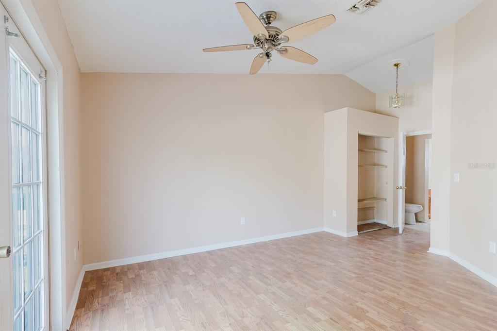 7804 Wilmar Court Port Richey, FL 34668 - Photo 16 of 82 a view of an empty room with a window