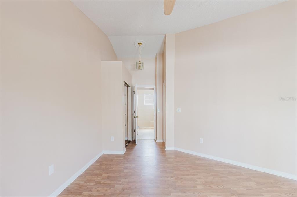 7804 Wilmar Court Port Richey, FL 34668 - Photo 17 of 82 a view of a hallway with wooden floor