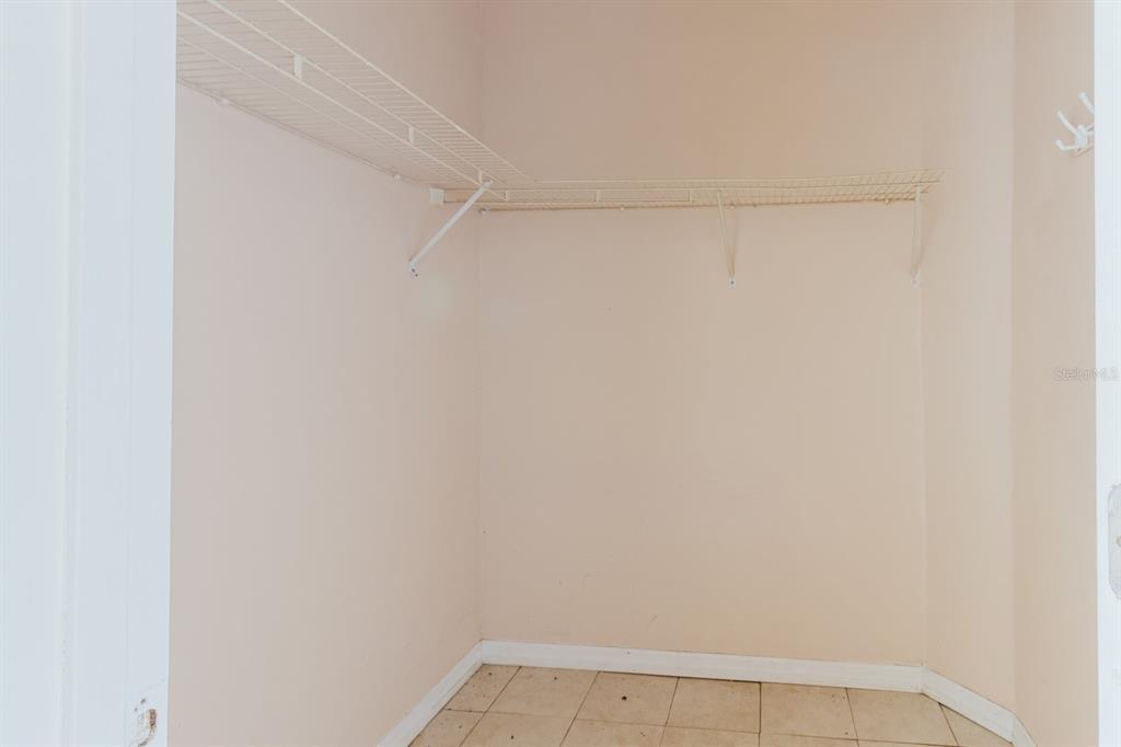 7804 Wilmar Court Port Richey, FL 34668 - Photo 23 of 82 a view of an empty walk in closet