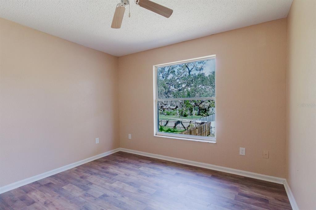 7804 Wilmar Court Port Richey, FL 34668 - Photo 28 of 82 an empty room with a window