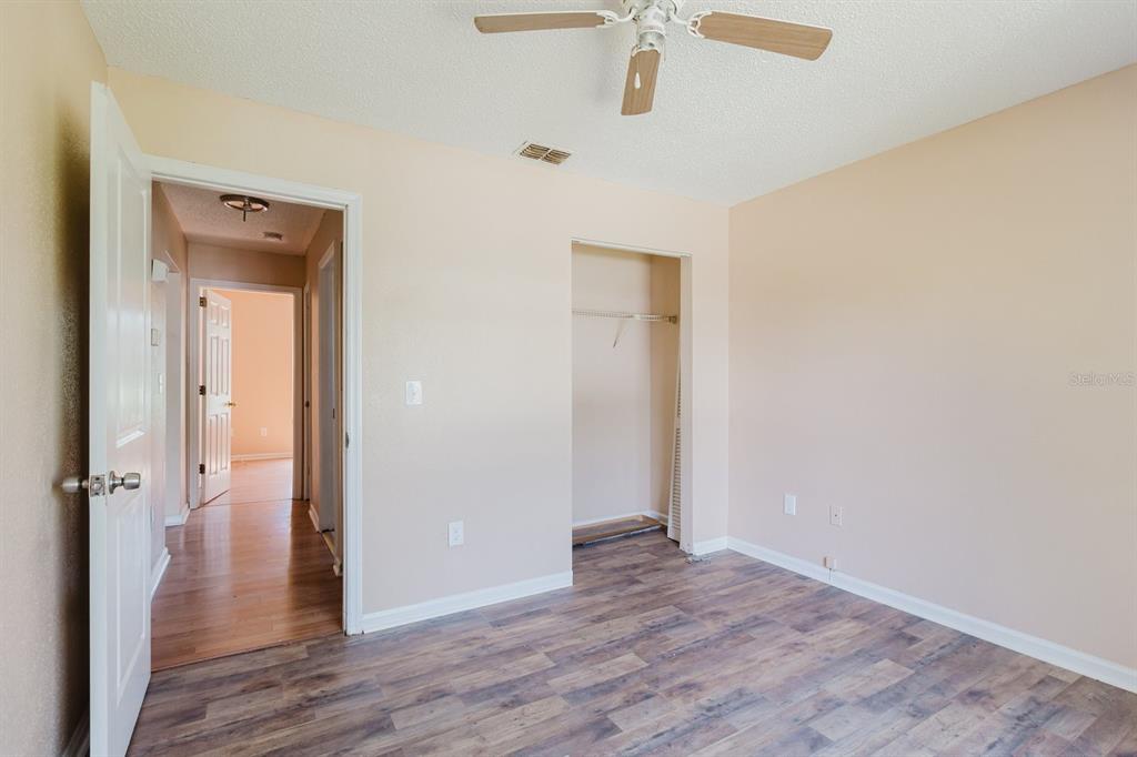 7804 Wilmar Court Port Richey, FL 34668 - Photo 29 of 82 wooden floor in an empty room
