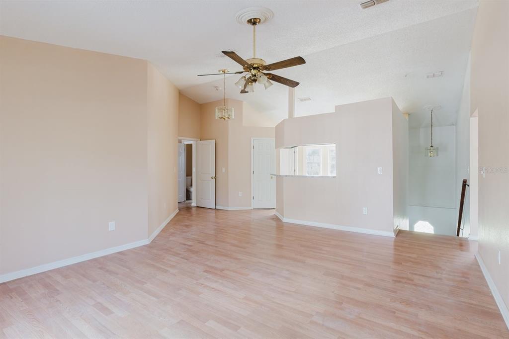 7804 Wilmar Court Port Richey, FL 34668 - Photo 5 of 82 a view of empty room with wooden floor