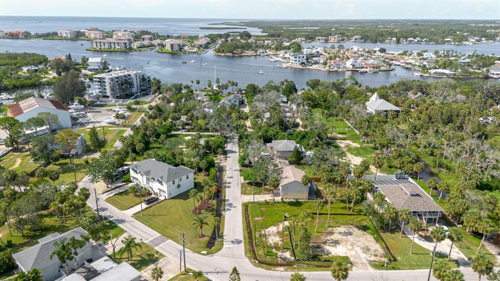 7804 Wilmar Court Port Richey, FL 34668 - Photo 62 of 82 an aerial view of residential houses with outdoor space