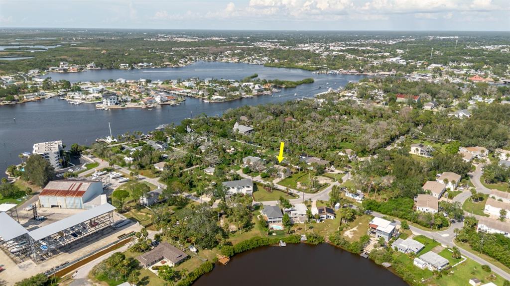 7804 Wilmar Court Port Richey, FL 34668 - Photo 67 of 82 an aerial view of residential building and lake
