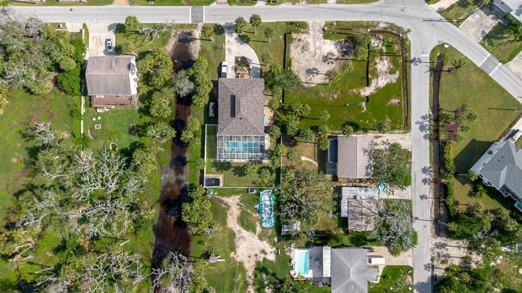 7804 Wilmar Court Port Richey, FL 34668 - Photo 78 of 82 an aerial view of residential houses with outdoor space