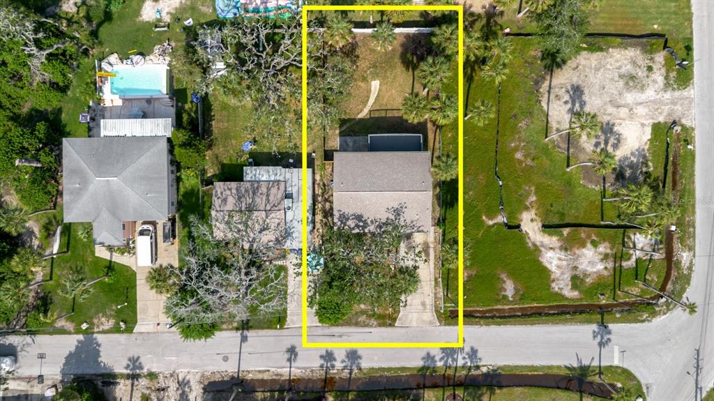 7804 Wilmar Court Port Richey, FL 34668 - Photo 81 of 82 an aerial view of a residential houses with outdoor space