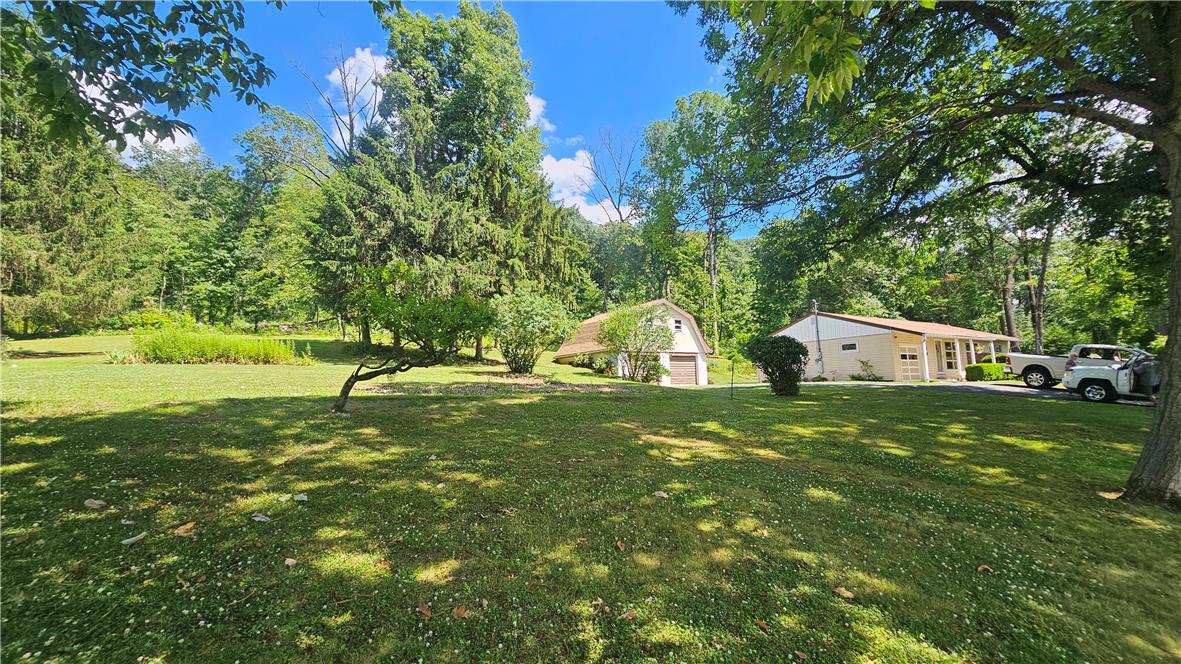 2529 Ringhoffer Road Hellertown, PA 18055 - Photo 32 of 33 A tranquil rural setting with ample green space and mature trees frames two charming residences.