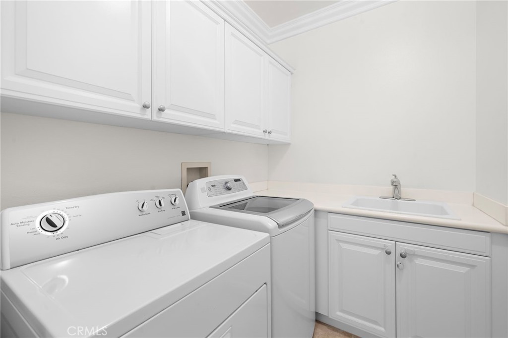 61 Shade Tree Irvine, CA 92603 - Photo 19 of 26 Individual laundry room with washer and dryer included.