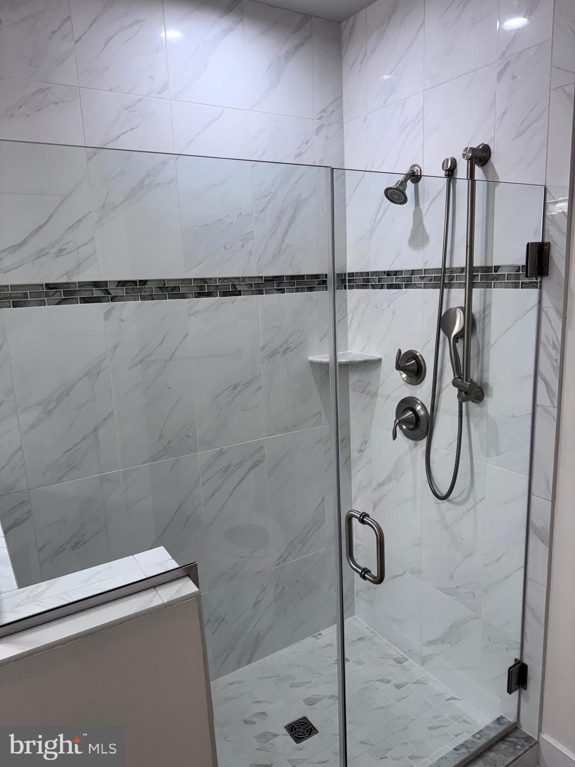 1000 Herons Nest Way, Unit 32 Chester, MD 21619 - Photo 15 of 28 a bathroom with a shower