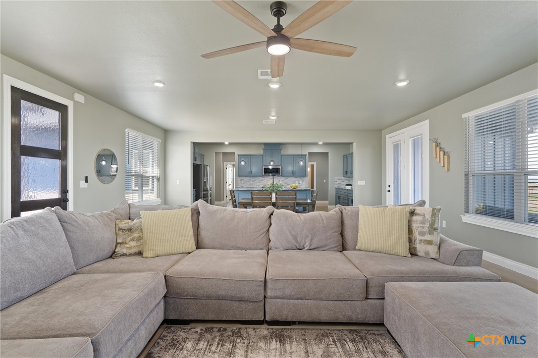 15073 Armstrong Ests Road Salado, TX 76571 - Photo 16 of 44 a living room with furniture and a large window